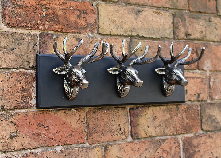 Elegant Triple Stag Head Ornament - Polished Silver Metal on Black Wooden Base - Modern Home Decor, Animal Lover's Gift - Premium  from Home Treasures - Just £22.99! Shop now at Home Treasures